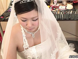Ill-lighted Emi Koizumi fucked on nuptial dress uncensored.
